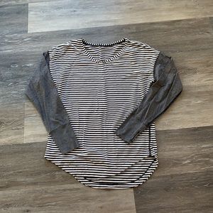 Striped long sleeve lululemon athletica with thumb holes. Size 6. M.